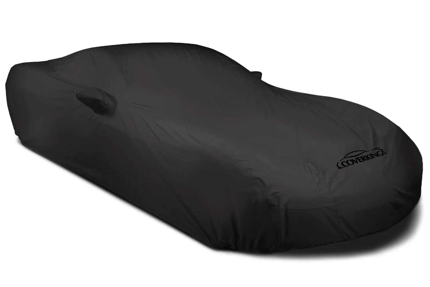 A black Coverking Stormproof cover fitted over a low sports car, with a mirror pocket and the Coverking name on the front corner.